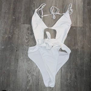 Wicked trendy one piece swimsuit